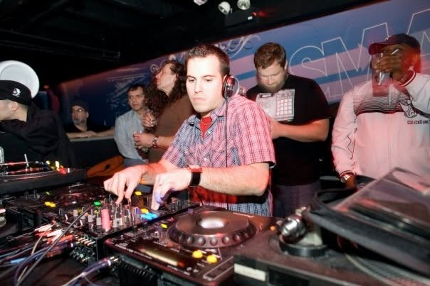 Brian Ffar mixing in a crowded booth